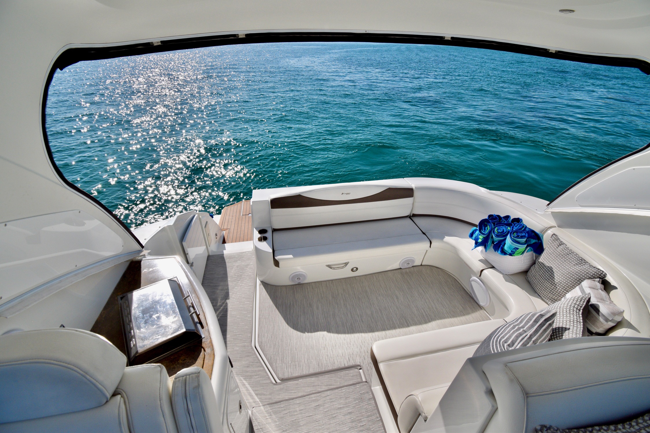 Outdoor cockpit seating and water views aboard the Miss B Haven