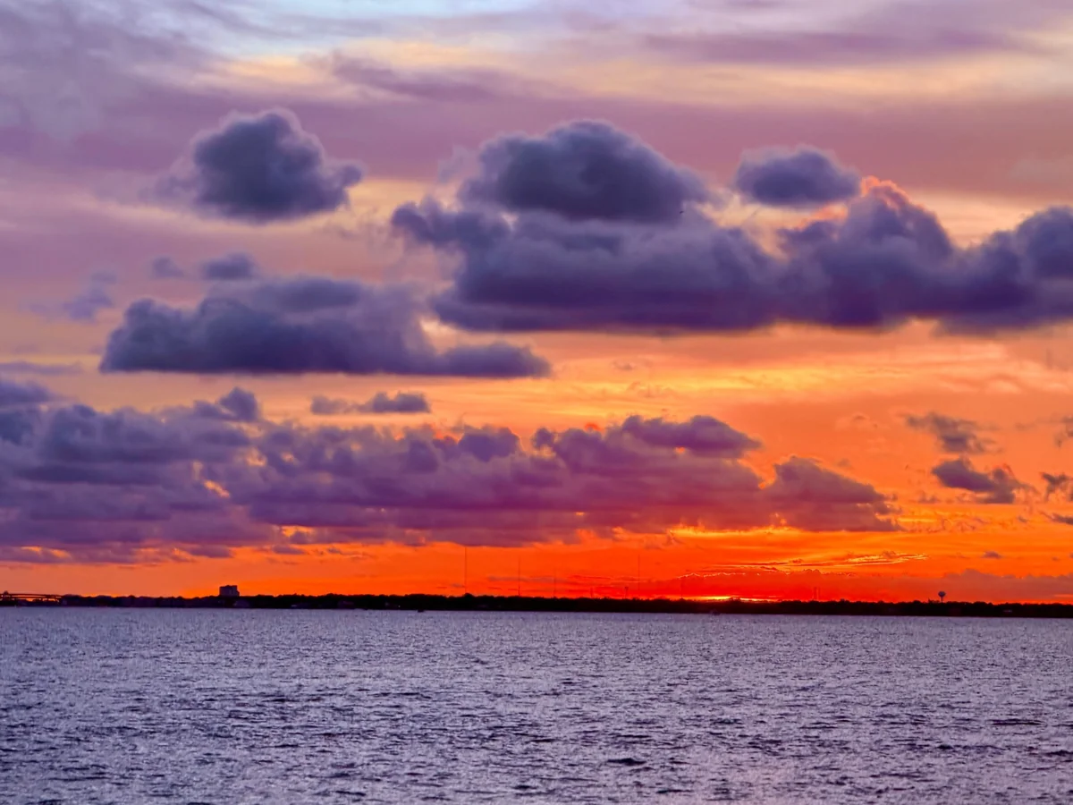 Orange and purple sunset over Destin waters