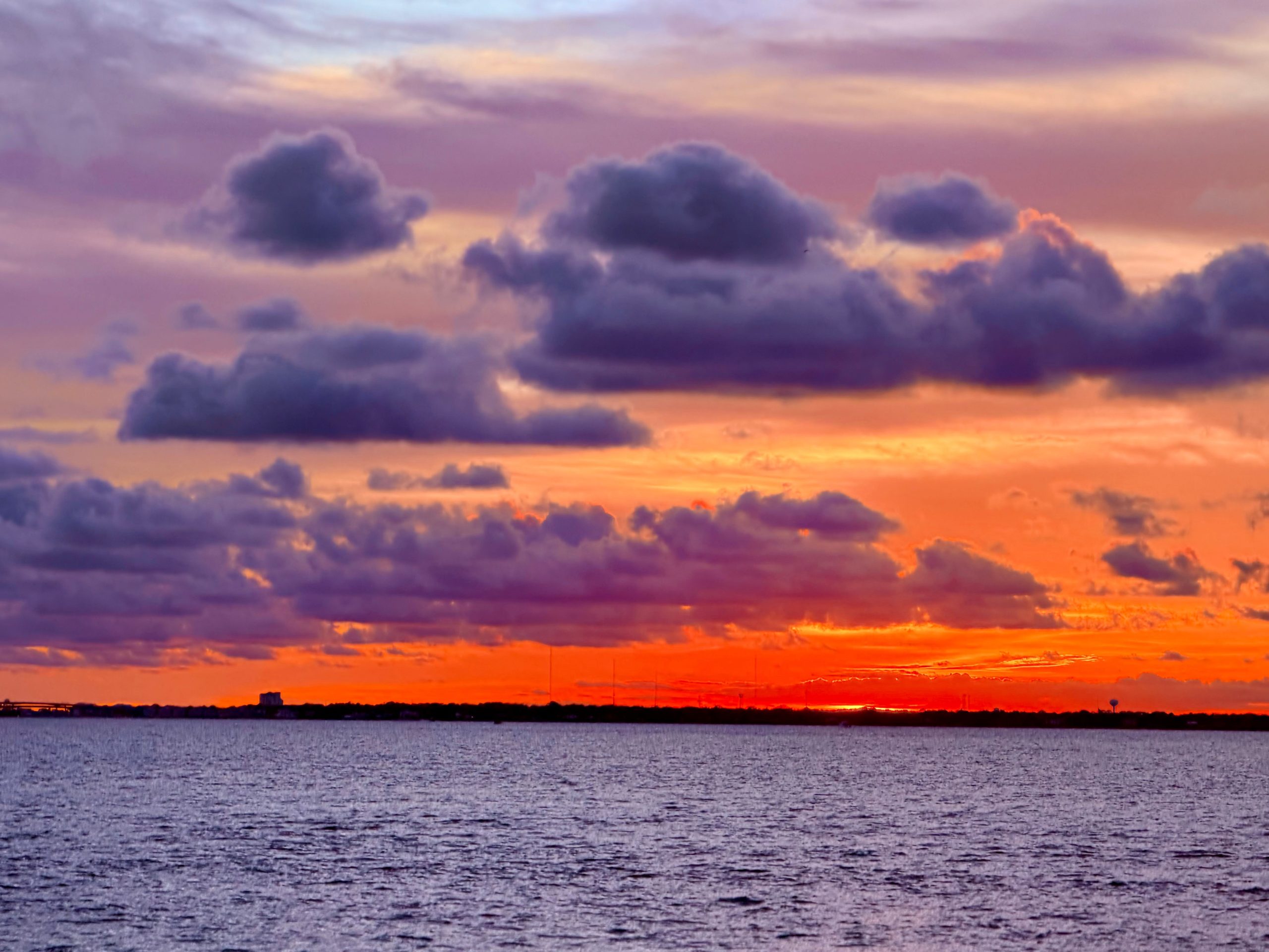 Orange and purple sunset over Destin waters