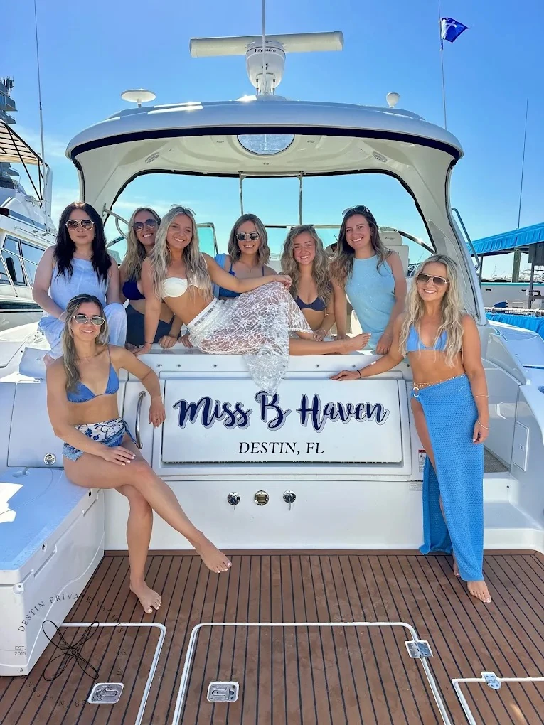 Bride and friends celebrating at the stern of the Miss B Haven